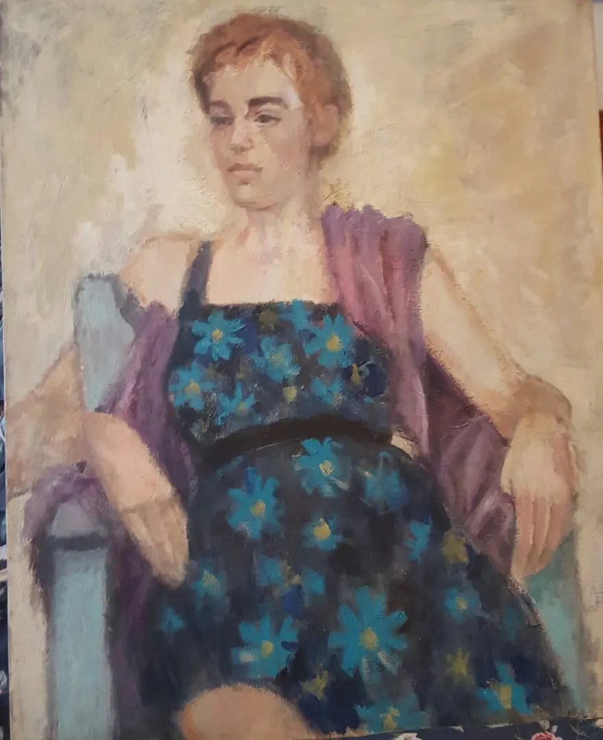 Seated Woman in Floral Dress